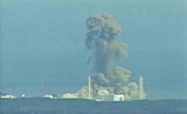Smoke rises from Fukushima Daiichi nuclear power complex in this still image from video footage
